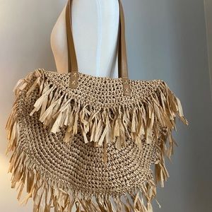 Fringed straw bag